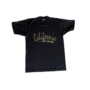 California vintage 80s black and glitter gold printed T-shirt • made in usa