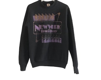90s Fruit Of The Loom Broadway Musical black and Glitter printed New York souvenir Sweatshirt • Vintage made in USA • M