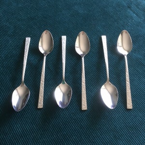 Navaho pattern, set of 6 Coffee spoons, International Silver, 4 3/8ths", demitasse spoon, 1847 Rogers flatware, 7 sets available - as new