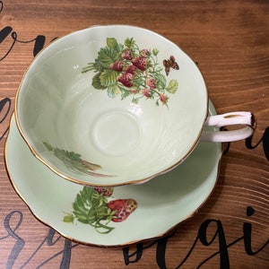 Elizabethan, Taylor & Kent, cup and saucer, pale green, strawberry pattern, wide mouth cup, gilt trim, footed base to cup