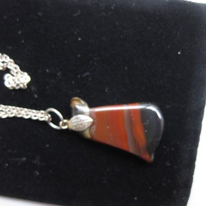 Polished Stone pendant, silver plated chain, 18 inches long, brown and black polished stone, 1 inch long
