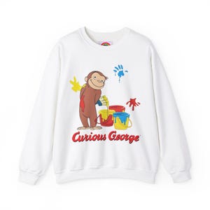 Curious George with Messy Paint Vintage Cartoon with Logo Unisex Heavy Blend™ Crewneck Sweatshirt