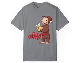 Camiseta unisex de manga corta con diseño de George el curioso pelando un  plátano, con dibujos animados modernos y logotipo en colores