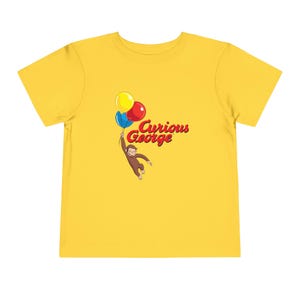 Curious George with Balloons Modern Cartoon with Logo Toddler Bella+Canvas Short Sleeve Tee