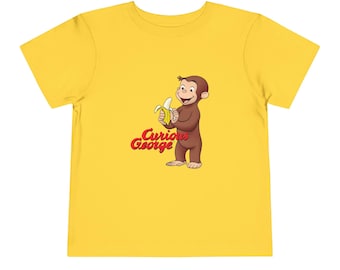 Curious George Peeling a Banana Modern Cartoon with Logo Toddler Unisex Bella+Canvas Short Sleeve Tee