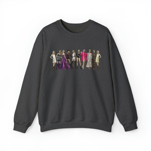 T.S. Eras Through the Years Unisex Heavy Blend™ Crewneck Sweatshirt