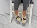 Handknit Wool Slippers: Warm Winter Knitwear product logo