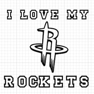 May include: Black and white graphic with the text "I LOVE MY ROCKETS" in a bold, blocky font. The Houston Rockets team logo is centered between the phrases.