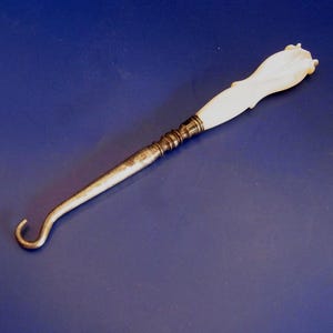 Antique Edwardian Mother of Pearl and Steel small button hook. 1900s glove hook. 1910s Clothing Fashion accessory