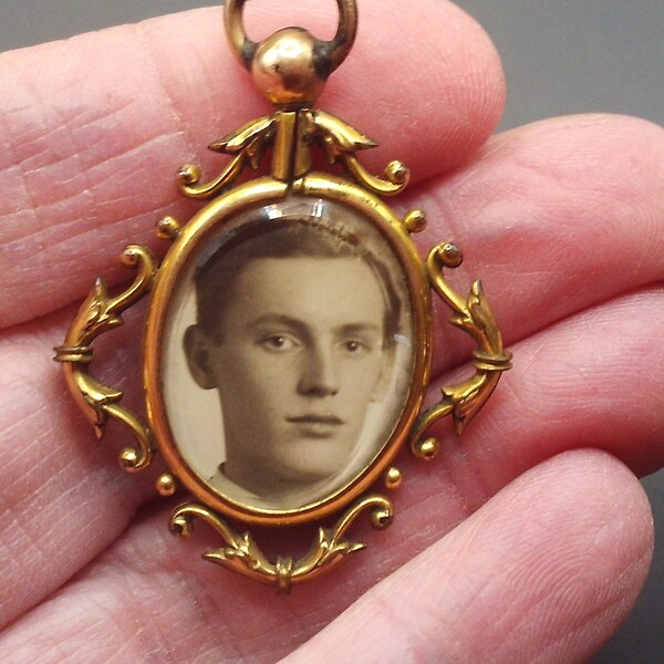 Antique British Victorian gold plated  Photo Locket Pendant Young man and woman circa late 1800s. sweetheart locket, mourning, keepsake