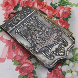 Antiguo cuaderno de memorias plateado de estilo Art Nouveau Zeebrugge con lápiz, alrededor del siglo XX.  Armorial, carnet de bal. castellano,