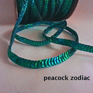 peacock zodiac (hologram) sequin trim--stretch and non-stretch