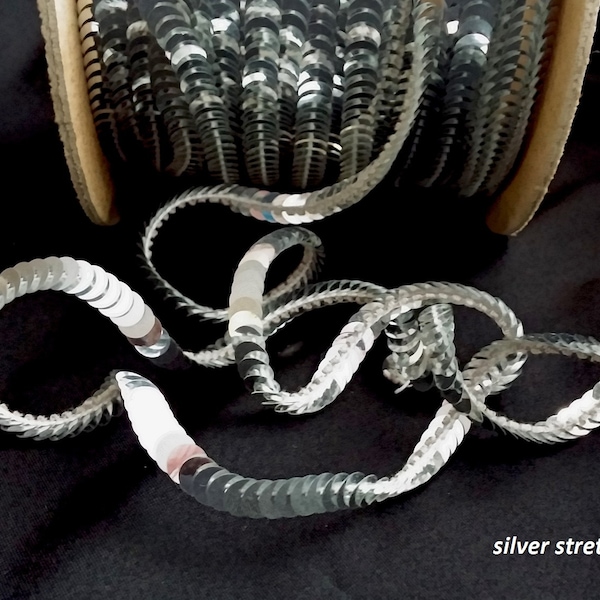 silver metallic sequin trim--stretch