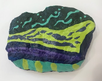 Joyful Painted Rock #18Medium is 4"long x 3"deep x 1"high and decorated with Acrylic Paint and signed by the artists' initials JS.