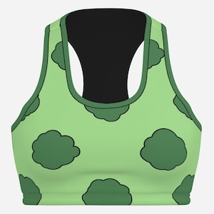 May include: A light green sports bra with a racerback design. The bra features a pattern of dark green cloud-like shapes. The racerback and trim are dark green, and the interior is black.