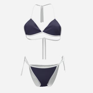 May include: A two-piece swimsuit set. The top is a halter style with navy blue triangle cups and white trim. The bottoms are navy blue with white trim and tie sides. The swimsuit is displayed against a white background.