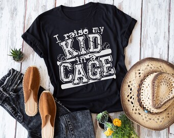 I Raise My Kid in a Cage Baseball Tee, Baseball Shirt, Baseball Mom, Baseball shirt for her, Baseball life, Baseball Season