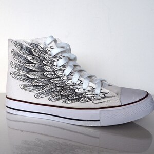 Sneakers with outlet wings on them
