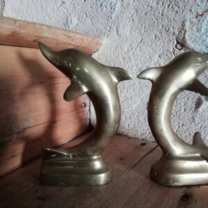 dolphins copper bookends ; gold, lovely condition