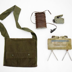 Genuine Vintage Military Practice Claymore Mine with Carrying Bag, Wire, and Remote Clicker