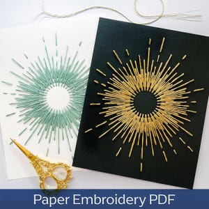 May include: Two pieces of paper with embroidered sunburst designs. One is on white paper with teal thread, the other on black paper with gold thread. Gold scissors are on the left. Text at the bottom reads "Paper Embroidery PDF".