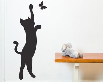 Cat catching butterfly wall sticker.