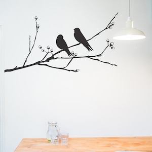 Muursticker Vogel op een tak
