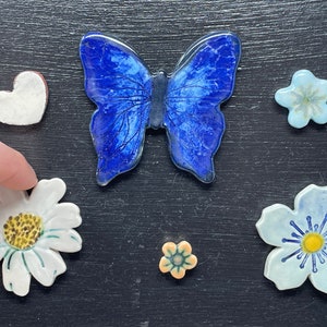 Cobalt blue Butterfly with blue, orange and white flowers ceramic fridge magnet set / magnetic canvas