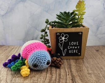 Handcrafted crocheted pride flag Spider buddy named Justice