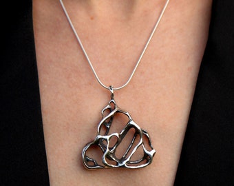 Collar llamativo de plata de ley oxidada, joya de arte orgánico hecha a mano