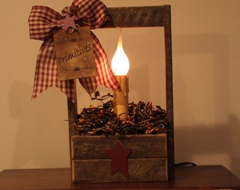 tobacco stick lanterns crafts. I have photos of some items I have on hand. I will also take orders for your decoration preferences. I have Wall lanterns, table lanterns, lantern hangers, with scalloped-wood-lanterns-set-of-2