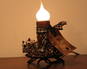 Iron Three Legged Candle Pan with a Chunky Electric Medium Base Candle Light with Berries and Kraft Tag