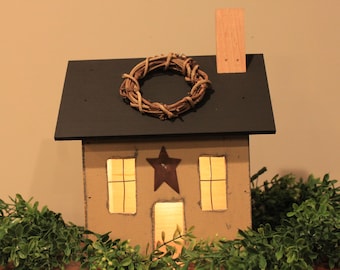 Petite Wooden distressed primitive house with low wattage bulb for ilumination