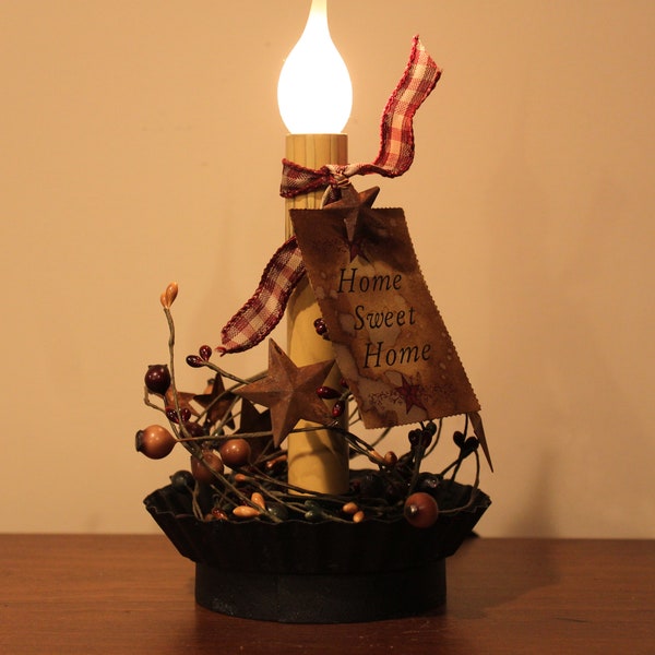 Grungy Black Fluted Candle Pan with an Electric Candleabra Light with berries, star and hang tag