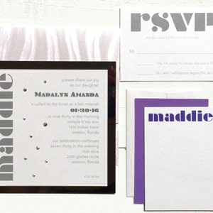 May include: A black and white invitation with silver text for a Bat Mitzvah celebration. The invitation includes the name Madalyn Amanda, the date 01-30-16, and the time 9:30 AM. The invitation also includes the location of the event, Temple B'nai Aviv, 1410 Indian Trace, Weston, Florida. The invitation also includes the time and location of the reception, 7:30 PM, Club Slice, 2600 Glades Circle, Weston, Florida.