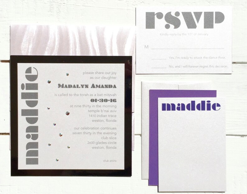 May include: A black and white invitation with silver text for a Bat Mitzvah celebration. The invitation includes the name Madalyn Amanda, the date 01-30-16, and the time 9:30 AM. The invitation also includes the location of the event, Temple B'nai Aviv, 1410 Indian Trace, Weston, Florida. The invitation also includes the time and location of the reception, 7:30 PM, Club Slice, 2600 Glades Circle, Weston, Florida.