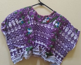 H4 Magnificent Guatemalan Huipil Blouse, a purple toned geometric design against a white and purple cotton fabric background.  Girl size.