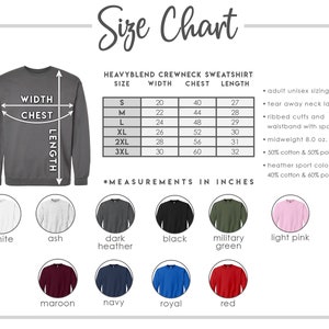 May include: Size chart for a heavy blend crewneck sweatshirt. The chart shows the width, chest, and length measurements in inches for sizes S through 3XL. The chart also includes information about the fabric composition and features, such as tear-away neck label, ribbed cuffs, and waistband with spandex.