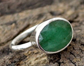 Oval Emerald Ring: Faceted Green Gemstone, Sterling Silver Bezel Setting