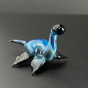 Cryptid Sculpture Electric Blue Black Nessie, Mini Glass Loch Ness Monster - plesiosaur- dinosaur - necklace - myths legend