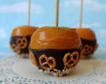 Faux Fake Realistic Caramel Apple with Chocolate and Pretzels Home Decor Photo Prop
