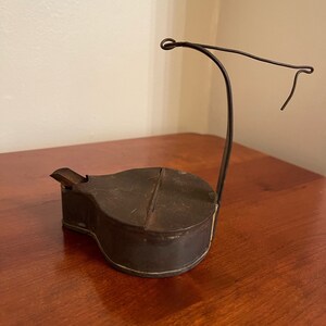 Antique sheet steel Betty lamp with hanger