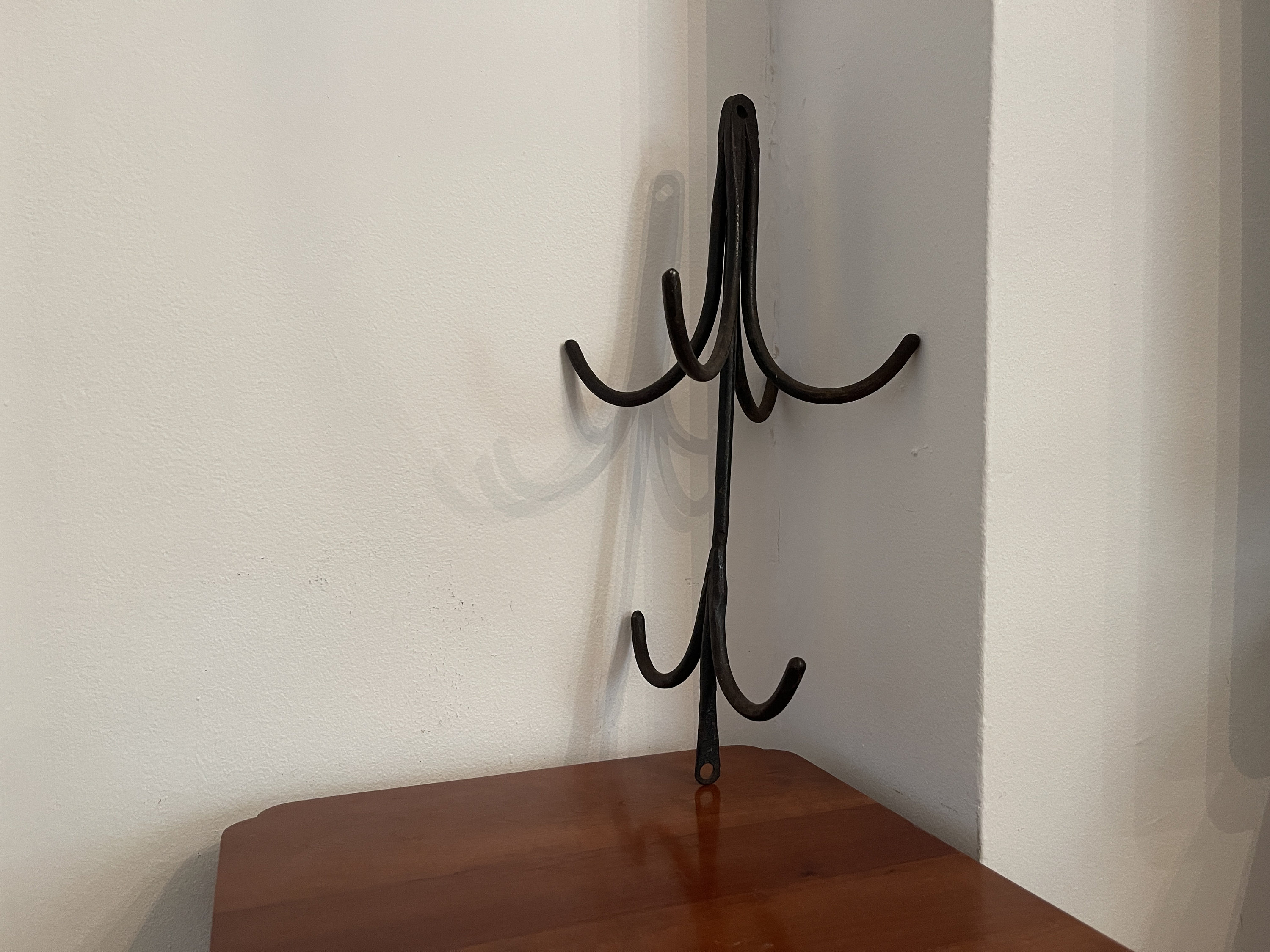 thumbnail interactive-video image 1 of Primitive Colonial Wrought Iron 2.5" Braided Black Hook - Wall Mounted, Handcrafted 1 of 5