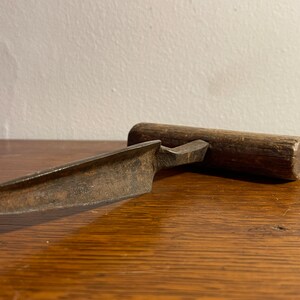 Antique wrought iron hole digger