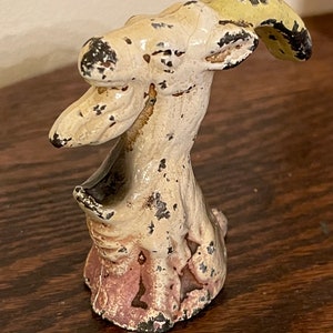 Cast Iron Billy Goat John Wright Musser F-74 Bottle Opener. Nice and rough.