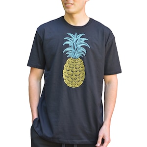 May include: A black t-shirt with a blue and yellow pineapple graphic.