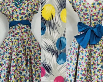 1950s fit and flare blue ribbon tie balloon / spotty print dress