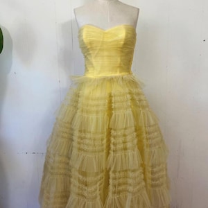 1950s yellow tulle ruffled prom dress