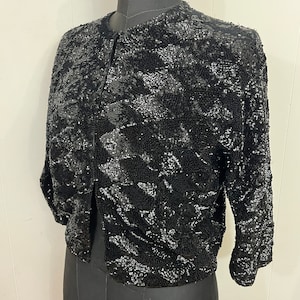 1950s L/XL heavily sequinned black wool & silk lined cardigan