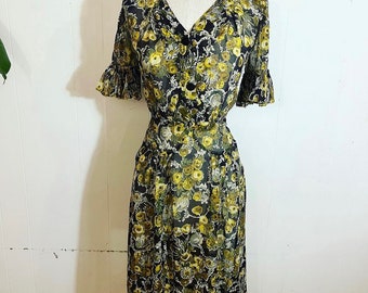 1940s floral dress with full circle cuffs